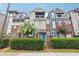 Charming townhomes with brick accents, blooming trees, and well-maintained landscaping, located in a desirable neighborhood at 1802 Dekalb Ne Ave, Atlanta, GA 30307