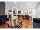 Open-concept living room features a dining area, hardwood floors, recessed lighting, and modern decor at 1802 Dekalb Ne Ave, Atlanta, GA 30307