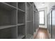 Custom walk-in closet with ample shelving and storage space for organized wardrobe solutions at 1802 Dekalb Ne Ave, Atlanta, GA 30307