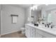 Bathroom featuring double sinks, modern fixtures, and a bright, clean design at 2735 Maple Park Pl # 32, Cumming, GA 30041