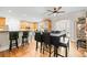 Spacious eat-in kitchen with ample counter space, stainless appliances, and hardwood flooring at 321 River Green Ave, Canton, GA 30114