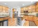 Well-appointed kitchen featuring stainless steel appliances, granite countertops, and an island at 321 River Green Ave, Canton, GA 30114