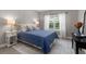 Lovely bedroom with a queen bed, matching nightstands, and soft natural light at 6840 Canyon Creek Way, Cumming, GA 30028