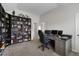 This bedroom features carpet, a ceiling fan and an entrance to the hallway at 6840 Canyon Creek Way, Cumming, GA 30028