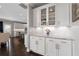 Stylish dining area with glass door cabinets and granite countertops at 6840 Canyon Creek Way, Cumming, GA 30028