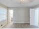 Bedroom featuring neutral carpet, ensuite bathroom, and bright window at 3120 Westwood Dr, Acworth, GA 30102