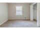 Bedroom with neutral-colored walls, carpet, and closet at 3120 Westwood Dr, Acworth, GA 30102