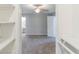 Cozy bedroom featuring neutral gray walls, carpet and ceiling fan with light at 3120 Westwood Dr, Acworth, GA 30102
