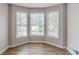 Bay window in a neutral color living room with wood-look flooring at 3120 Westwood Dr, Acworth, GA 30102