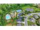 Desirable neighborhood amenities with swimming pool, tennis courts, playground, pond, and mature trees at 7470 Oldbury Pl, Cumming, GA 30040