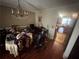 Cozy dining area featuring a chandelier, hardwood floors, and a classic design at 1856 Butler Bridge Rd, Covington, GA 30016
