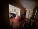 Warm and inviting entryway with hardwood floors, decorative mirror, and open layout at 1856 Butler Bridge Rd, Covington, GA 30016