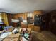 Spacious eat-in kitchen featuring classic wood cabinets and an overhead oven at 1856 Butler Bridge Rd, Covington, GA 30016