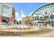 The shopping center features a charming water fountain, creating a relaxing and inviting atmosphere for shoppers near the Dining Pavilion at 1884 Copelyn Reese Court (Lot 166), Lawrenceville, GA 30043