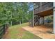 A backyard that has a patio, as well as stairs that are adjacent to the deck at 27 Rose Brooke Cir, White, GA 30184