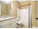 Bathroom featuring a shower-tub combo, granite countertop, and neutral color palette at 27 Rose Brooke Cir, White, GA 30184