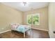 Cozy bedroom featuring hardwood floors and natural light at 27 Rose Brooke Cir, White, GA 30184