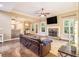 Inviting living room featuring a stone fireplace, hardwood floors, and an open floor plan at 27 Rose Brooke Cir, White, GA 30184