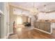 Spacious home showcasing an open layout of the living room, kitchen, and stairs at 27 Rose Brooke Cir, White, GA 30184