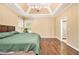 Bright main bedroom showcases an ensuite bathroom, hardwood floors, and an open space at 27 Rose Brooke Cir, White, GA 30184