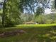 A well-maintained lawn leading up to a charming single-story home at 7125 Chappell Cir, Atlanta, GA 30360