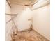 Walk-in closet featuring wire shelving, and a concrete floor at 7125 Chappell Cir, Atlanta, GA 30360