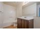 Full bathroom featuring a tub-shower combo and a single sink vanity at 1249 Scripps Sw Ct, Marietta, GA 30008