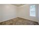 Neutral bedroom with carpet, a window, and fresh paint at 1249 Scripps Sw Ct, Marietta, GA 30008