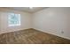 Bedroom with neutral walls, plush carpeting, natural light, and ample space at 1249 Scripps Sw Ct, Marietta, GA 30008