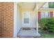 The front entrance of a charming single story home featuring brick and vinyl siding at 1249 Scripps Sw Ct, Marietta, GA 30008