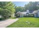Charming single story home with brick and vinyl siding and a manicured lawn at 1249 Scripps Sw Ct, Marietta, GA 30008