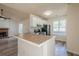 Bright kitchen with a breakfast bar overlooking the living room and stainless steel appliances at 1249 Scripps Sw Ct, Marietta, GA 30008