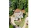Aerial view of a beautiful home with a well-maintained yard and mature trees at 2968 Ovalene Sw Ct, Marietta, GA 30064