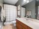 Bathroom with a vanity and neutral finishes, complemented by a shower-tub combo at 2968 Ovalene Sw Ct, Marietta, GA 30064