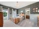 Charming bedroom featuring decorative wallpaper, plush carpet, and natural light at 2968 Ovalene Sw Ct, Marietta, GA 30064
