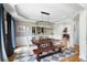 Well-lit dining area featuring a modern light fixture and stylish decor at 2968 Ovalene Sw Ct, Marietta, GA 30064