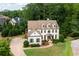 Beautiful home with manicured lawn, elegant design, and mature trees at 2968 Ovalene Sw Ct, Marietta, GA 30064