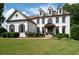 Lovely two-story home with manicured lawn and charming front porch with wood columns at 2968 Ovalene Sw Ct, Marietta, GA 30064