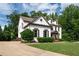 Charming home with a well-manicured lawn, beautiful landscaping, and a welcoming front entrance at 2968 Ovalene Sw Ct, Marietta, GA 30064