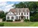 Beautiful exterior of home with manicured landscaping, mature trees, and a welcoming entrance at 2968 Ovalene Sw Ct, Marietta, GA 30064