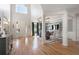 Grand foyer featuring hardwood floors, a high ceiling, and views into the dining area at 2968 Ovalene Sw Ct, Marietta, GA 30064