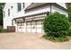 Three-car garage with pergola and updated garage doors at 2968 Ovalene Sw Ct, Marietta, GA 30064