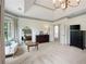 Large main bedroom with gray carpeting, dark furniture and a sitting area by the windows at 2968 Ovalene Sw Ct, Marietta, GA 30064
