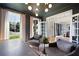 Well-lit office with modern lighting, stylish decor, and a view into the dining area at 2968 Ovalene Sw Ct, Marietta, GA 30064