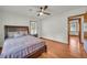 Comfortable bedroom with hardwood floors, large bed, and good natural light at 2320 Tilson Cir, Decatur, GA 30032