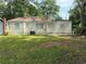 Spacious backyard with lush lawn and shade at 888 Beecher Sw Ct, Atlanta, GA 30311