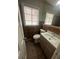 Tidy bathroom featuring a large mirror and updated vanity at 888 Beecher Sw Ct, Atlanta, GA 30311