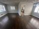 Bright living room featuring beautiful hardwood floors and natural light at 888 Beecher Sw Ct, Atlanta, GA 30311