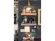 Stylish bar area with wooden shelves, decorative lighting, and decor in a modern home at 1354 Fernwood Ne Cir, Brookhaven, GA 30319