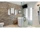 Spa-like bathroom featuring a soaking tub, glass shower and white subway tile at 1354 Fernwood Ne Cir, Brookhaven, GA 30319